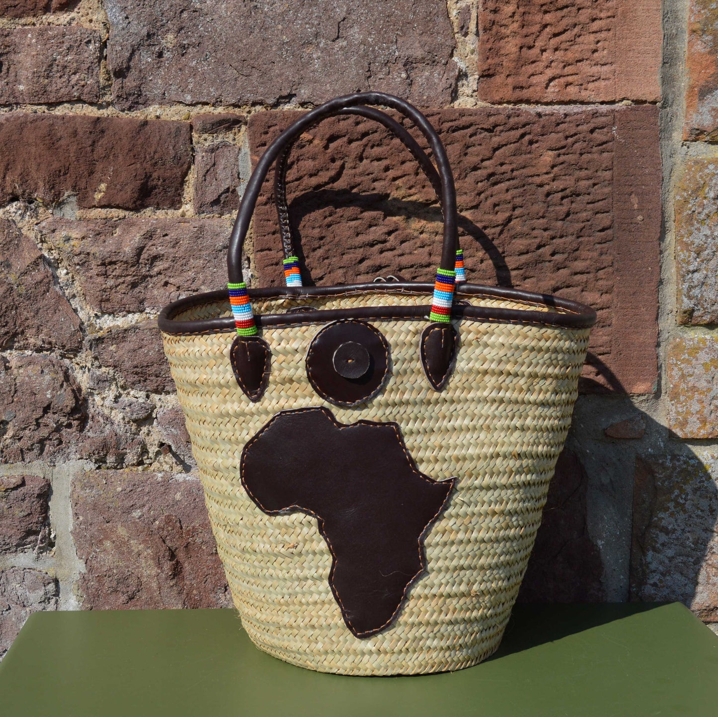Beaded Tanzanian Seagrass Baskets with hand stitched Leather & Beaded Motifs