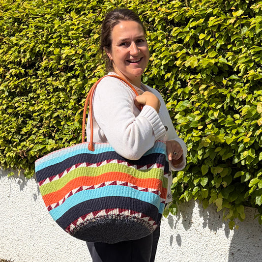 Woollen Kiondo Basket Pale Blue, Navy, Lime, Orange B&W with long Leather handles.