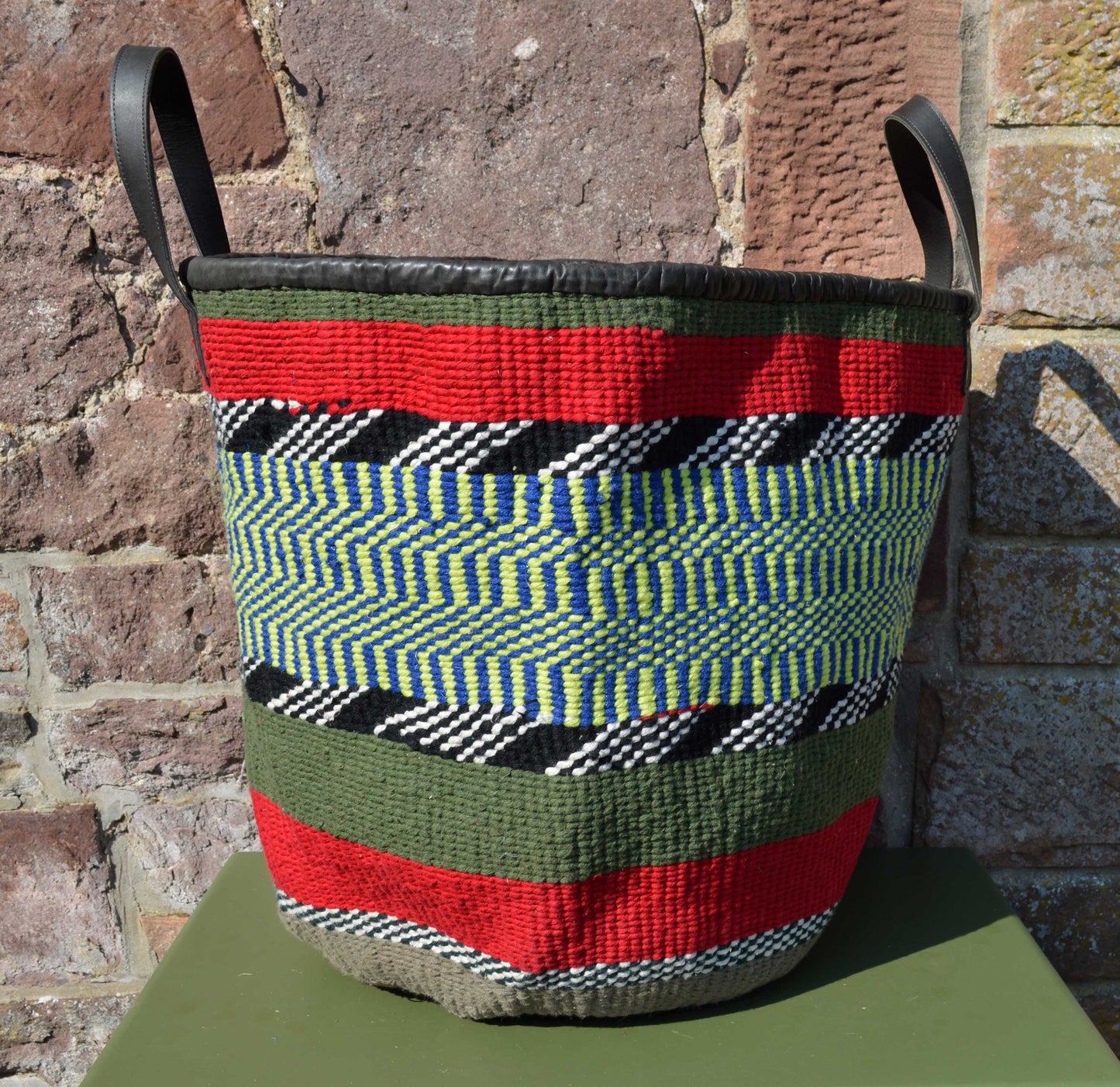Giant Woollen Kiondo style Lined Basket with heavy duty Mocha leather trim & handles.Green, Red, B&W, Blue & Yellow Hoops.