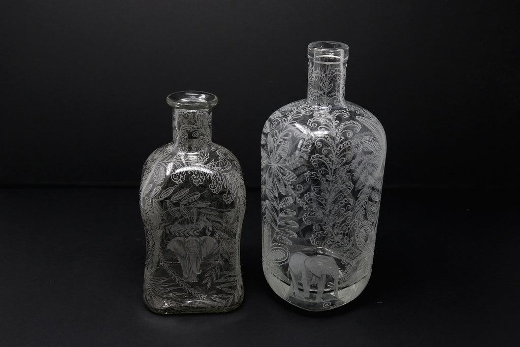 Bottles, Re-cycled & Engraved with Hidden Elephant