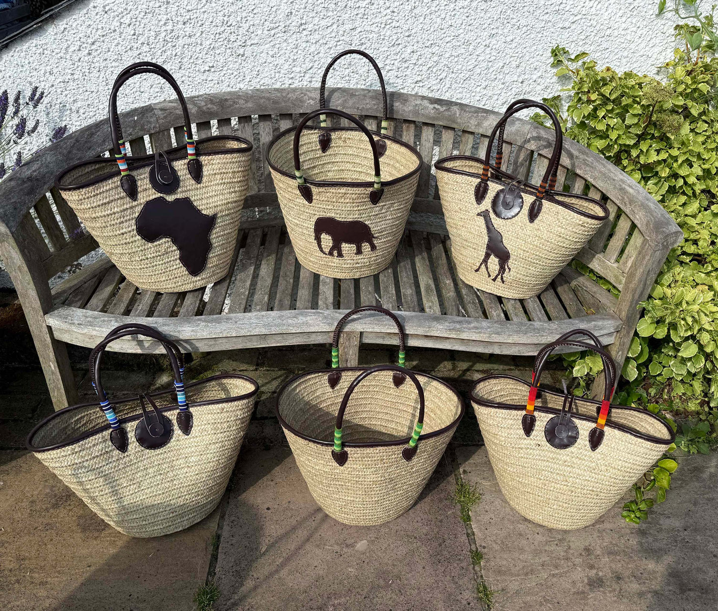 Beaded Tanzanian Seagrass Baskets with hand stitched Leather & Beaded Motifs