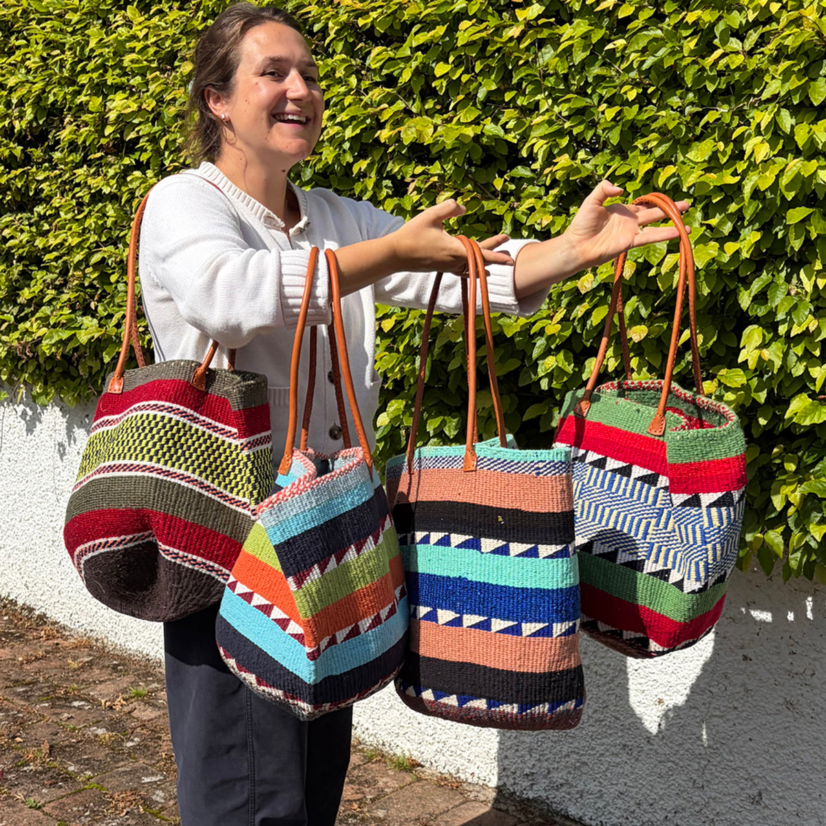 Woollen Kiondo Basket Blue, Mustard, Pink, B&W with long Leather  handles.