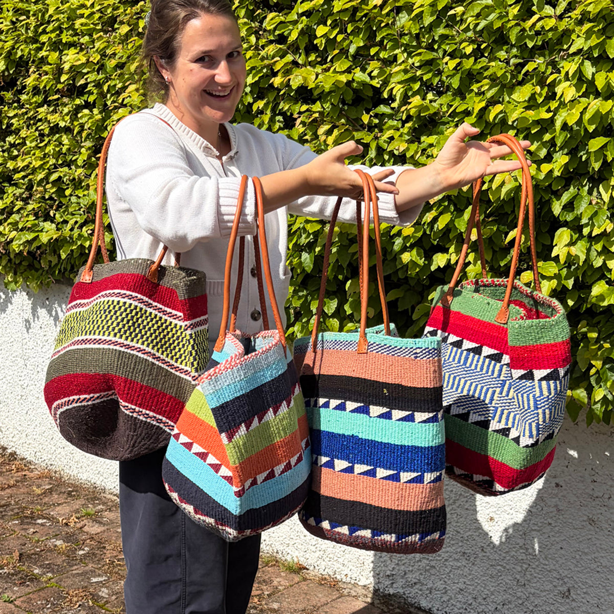 Woollen Kiondo Basket Powder Blue, Navy, Yellow, Pink, Red & White zigzags with long Leather handles.