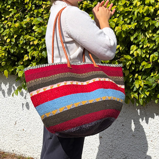 Woollen Kiondo Basket Burgundy, Reds Greys, charcoal & Mustard Hoops with long Leather handles.