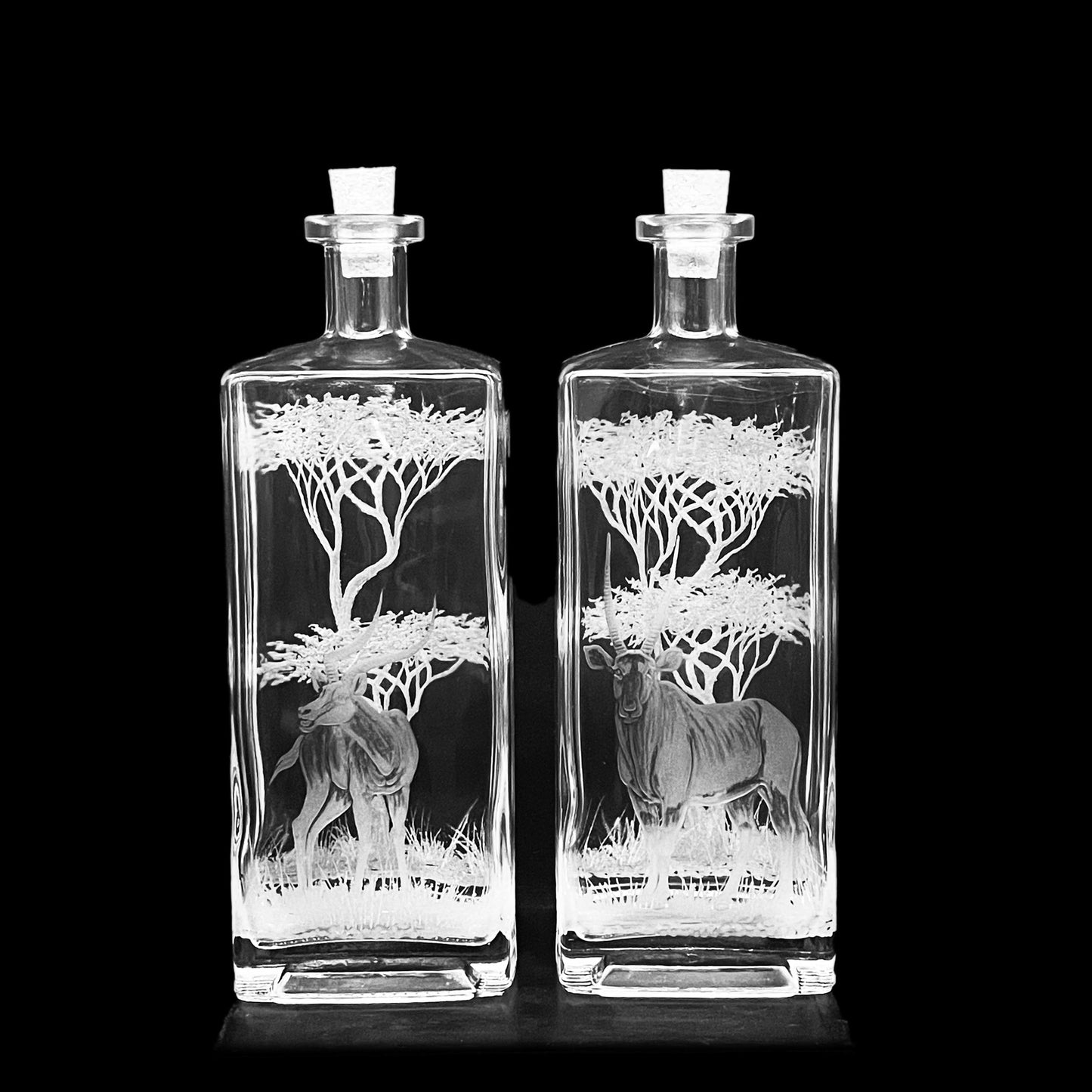 PAIR of Bottles, Engraved with Antelope