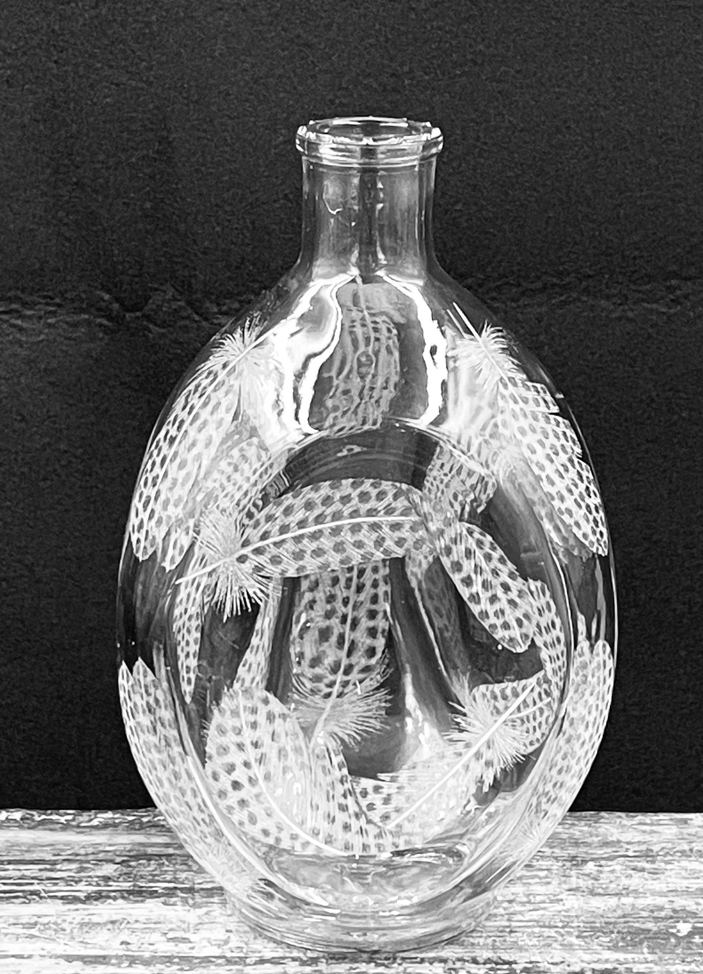 Dimple Bottle, Engraved with Guinea Fowl Feathers