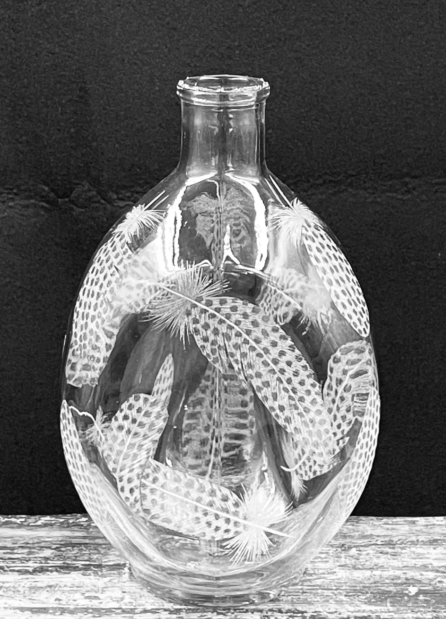 Dimple Bottle, Engraved with Guinea Fowl Feathers