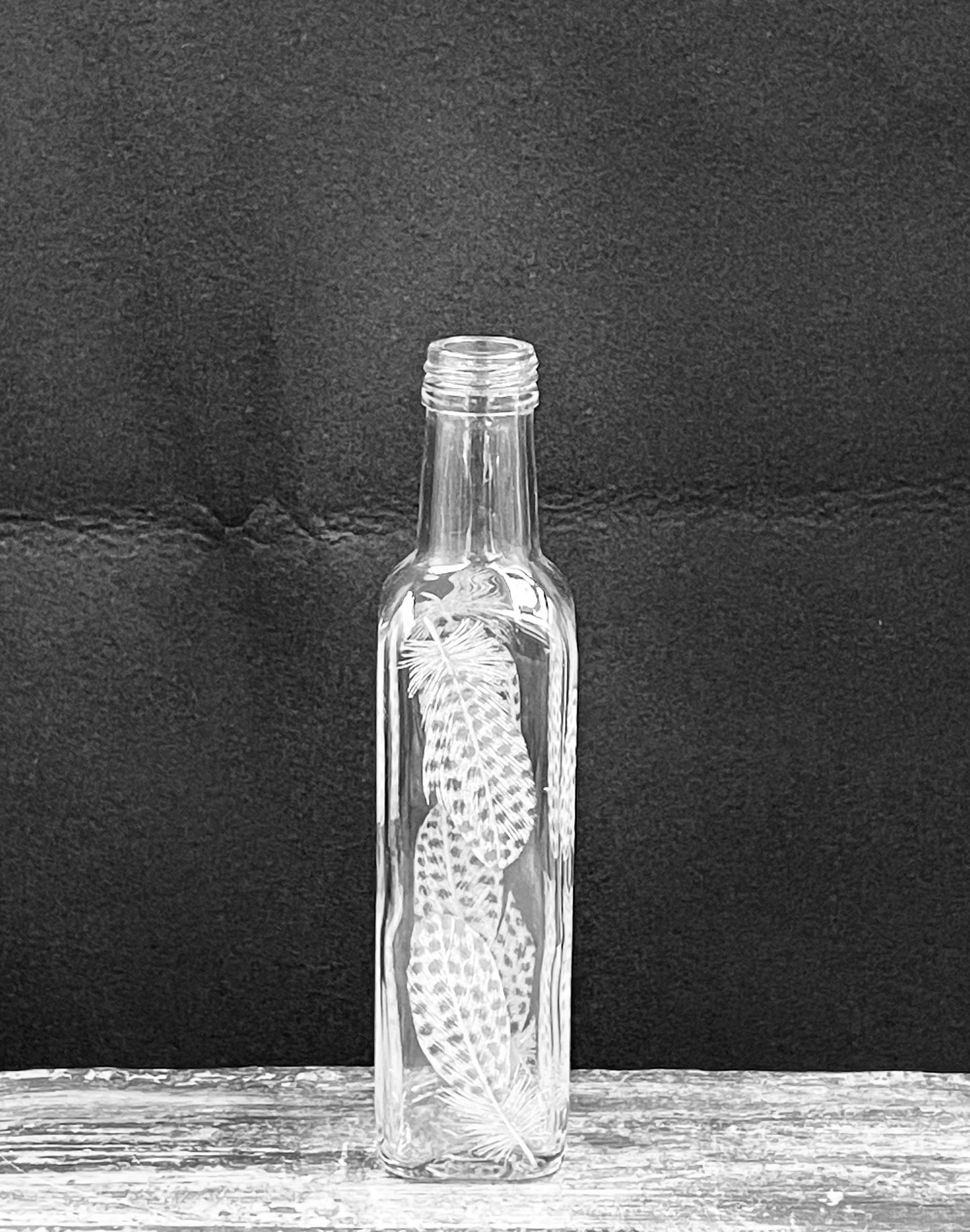 Bottles, Engraved with Guinea Fowl Feathers
