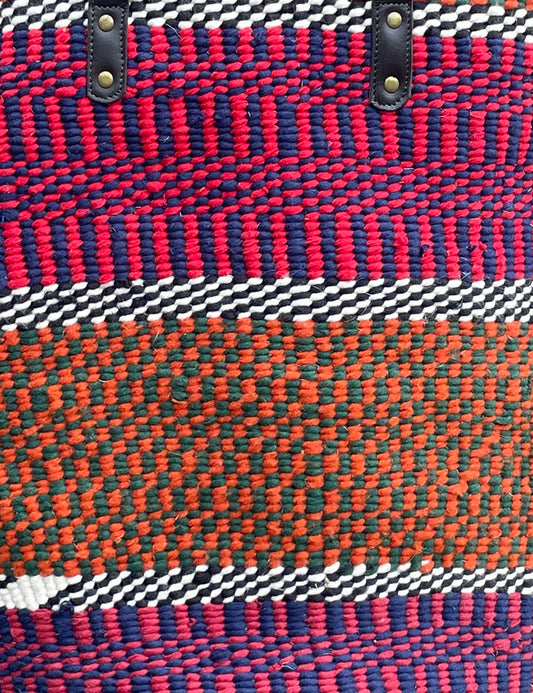 Giant Woollen Kiondo Basket with heavy duty Mocha leather trim & handles. Burgundy Reds, Navy Blue, B&W zigzags, Orange & Green Hoops.