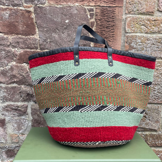 Giant Woollen Kiondo Basket with heavy duty Mocha leather trim & handles. Red & Pale Green Hoops, B&W zigzags, Burnt Orange & Green Check.