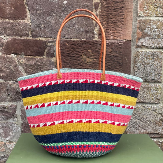 Woollen Kiondo Basket Powder Blue, Navy, Yellow, Pink, Red & White zigzags with long Leather handles.